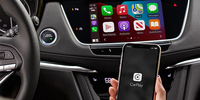 Phone and the Center Console in a Cadillac car featuring different apps